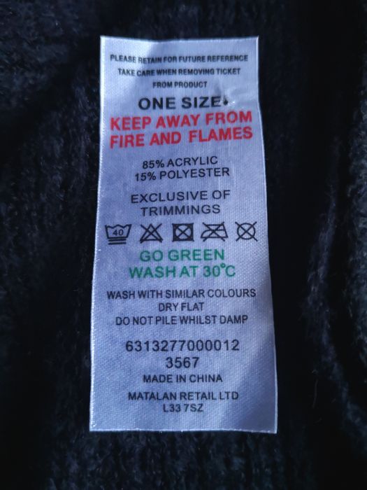 Тепла накидка пончо з китичками