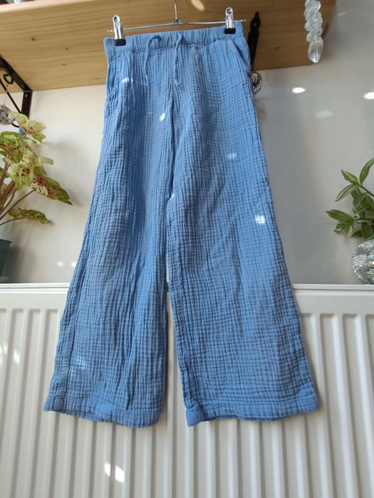 Spodnie luźne muślinowe letnia szerokie dzwony 134