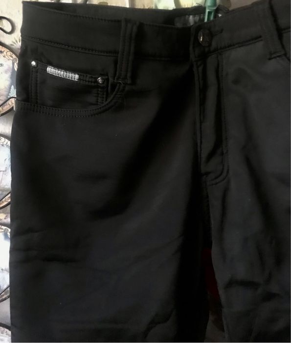 Теплые брюки на флисе большого размера