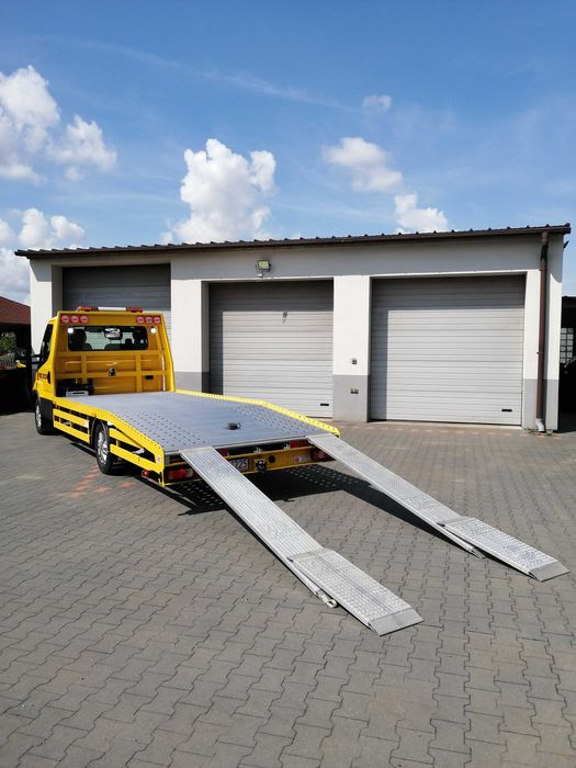 Pomoc Drogowa24h Holowanie Usługi transportowe