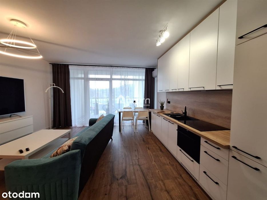 Apartamenty pod Dębowcem. Miejsce postojowe,