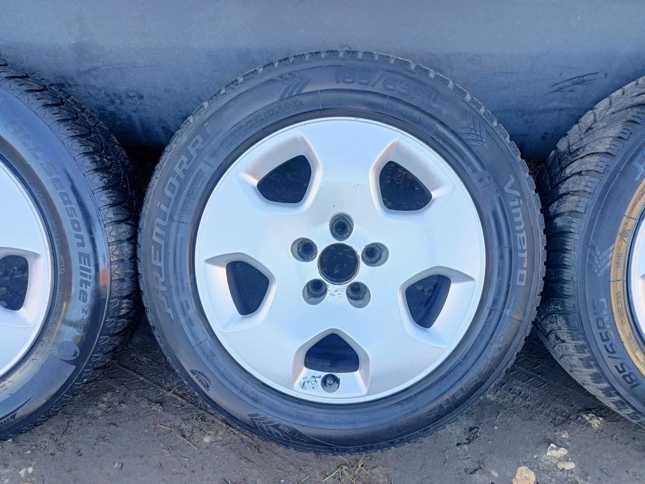 Felgi z oponami 185/65R15 wielosezon 24r Audi 5x100 A1 A2 A3 chrysler