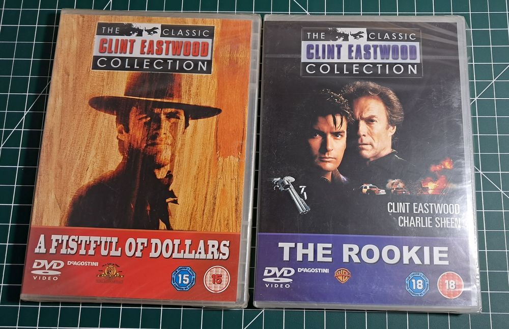 Clint Eastwood 2 filmy DVD folia Charlie Sheen Żółtodziób Za garść $