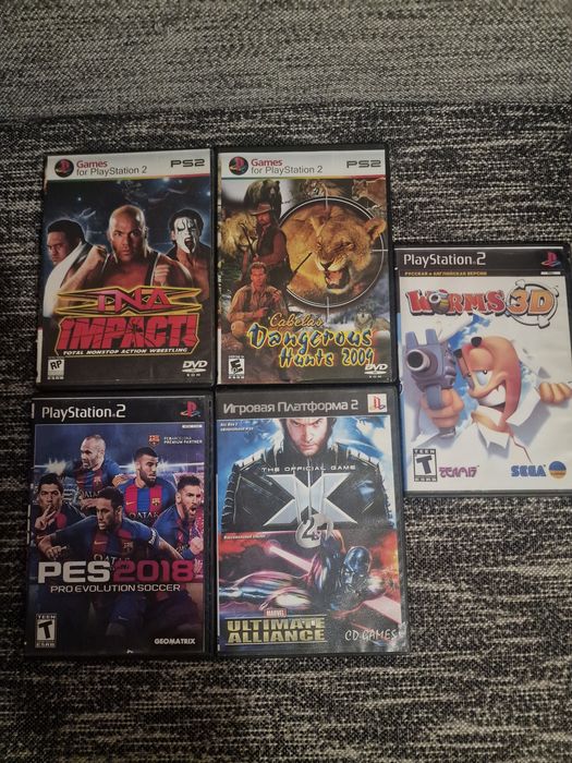 Sony PlayStation 2 Slim (SCPH-90004) + 2 джойстики + 5 ігор