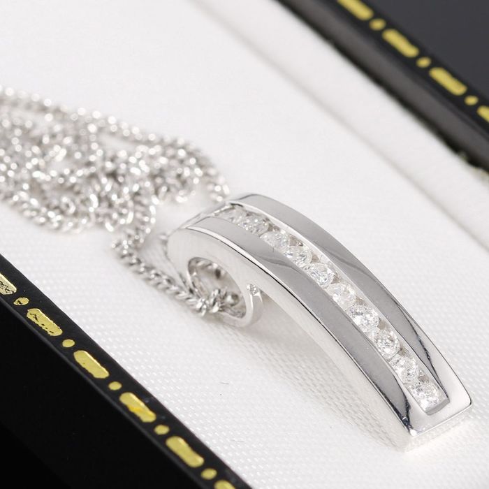 Złota zawieszka z brylantami 0.25ct na łańcuszku białe złoto 9K
