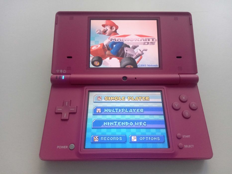 Nintendo DSi XL różowa , ładowarka , karta SD 2 GB , 3 gry