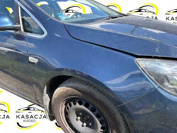 Błotnik prawy przód przedni Opel Astra J kolor z22a
