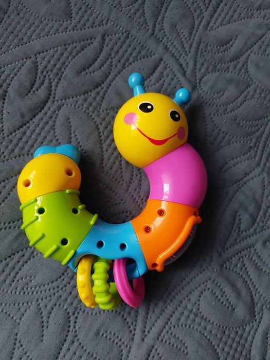 Іграшка брязкальце. Гусениця