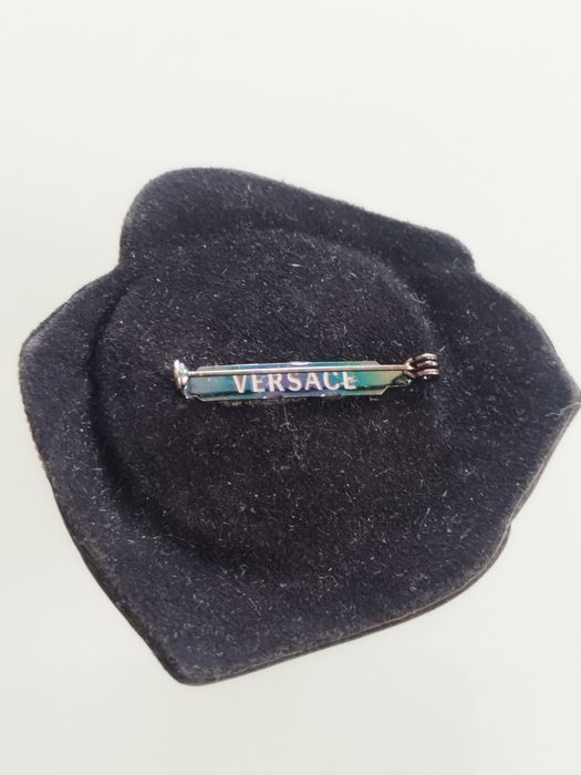 Lindo broche Versace . Estado muito bom.