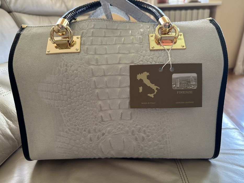 Нова кожана сумка.