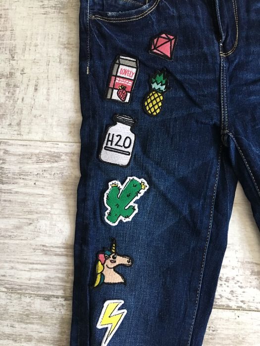 Nowe spodnie jeansowe z naszywkami Mohito xs 34