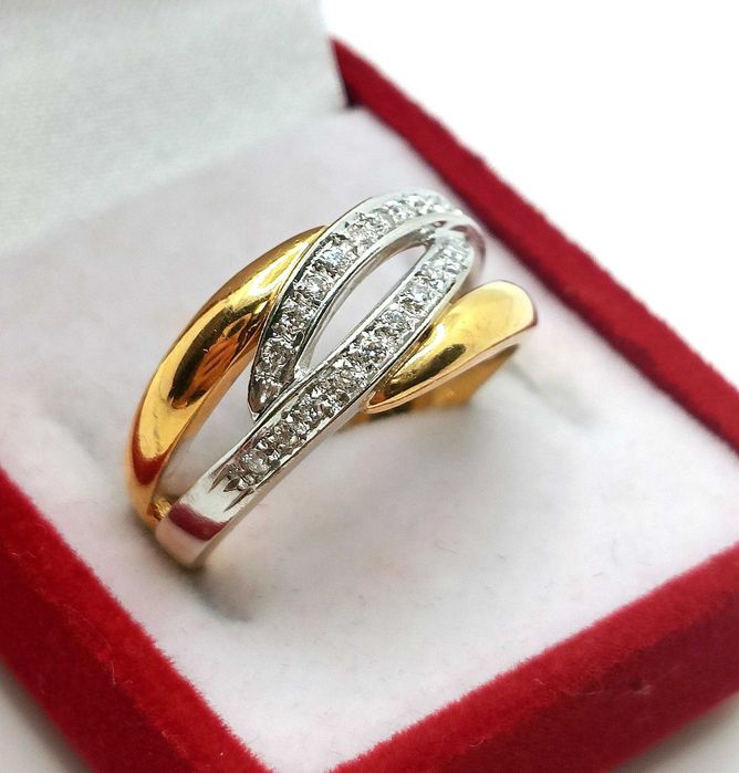 Złoty pierścionek z diamentami 20szt 0,20ct Pr.750 W:5,68gr R.17