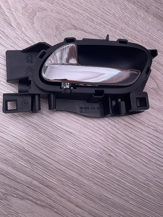 Nowa klamka wewnetrzna Peugeot 207