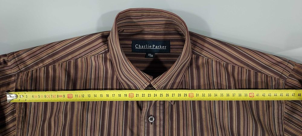 Camisa em excelente estado - L