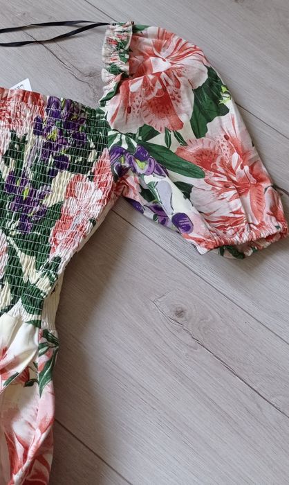 Nowy kombinezon w kwiatki H&M rozm Xs