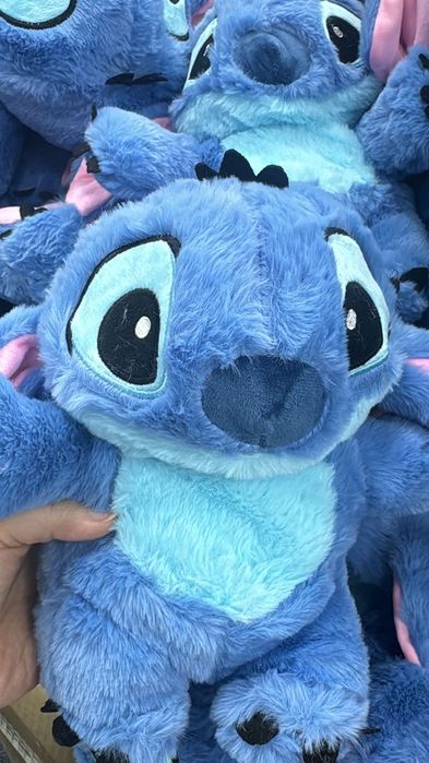 Stitch . E Angel que respira e toca várias músicas