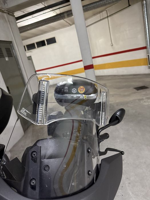 Defletor de vento mota