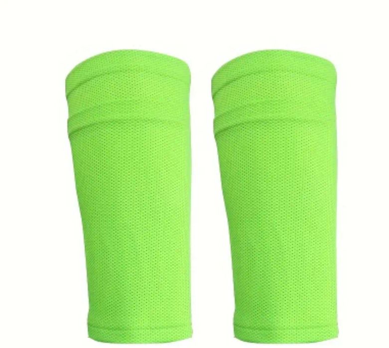 Тримачі  для футбольних щитків