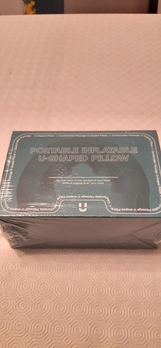 Portable inflatable U-shaped pillow