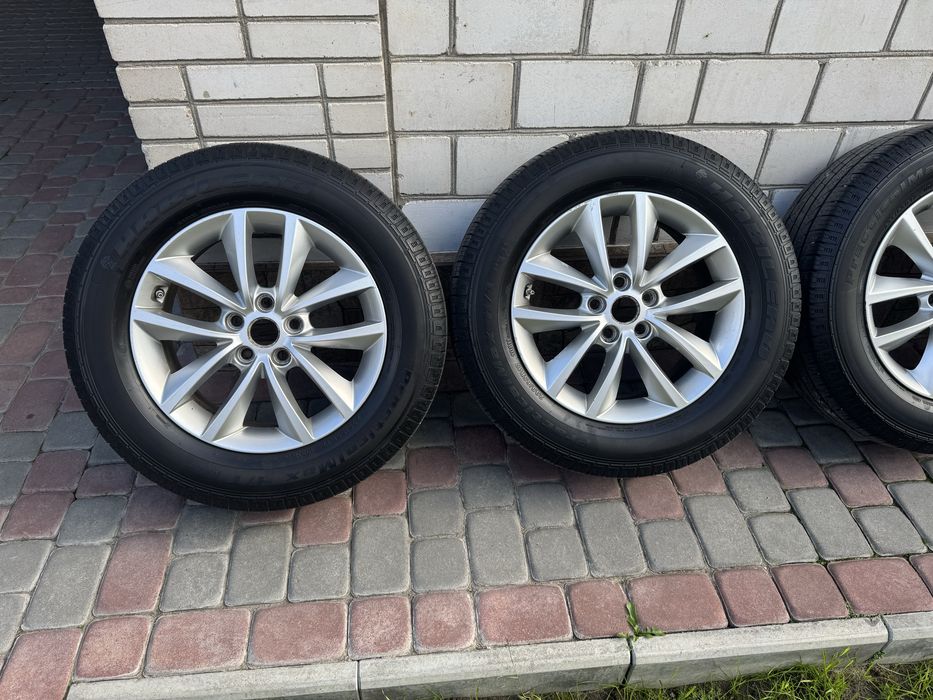 Комплект оригінальних дисків з шинами 5.114.3 R17.