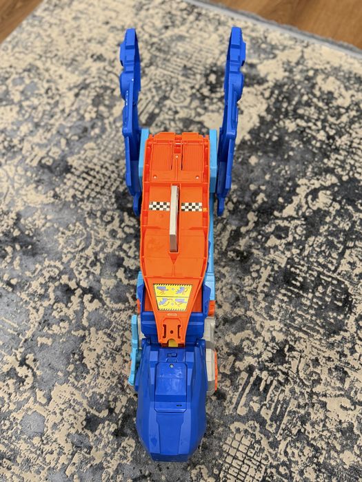 Мегатранспортер hot wheels ті рекс