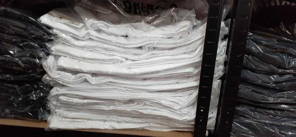 T-shirt em stock diretamente do preço FOB de fábrica