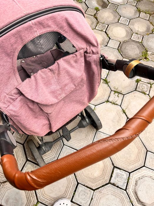 Дитяча прогулочная коляска
