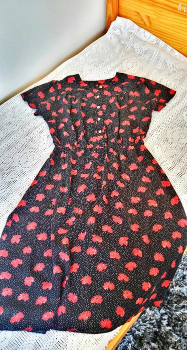 Vestido floral com manga flutuante