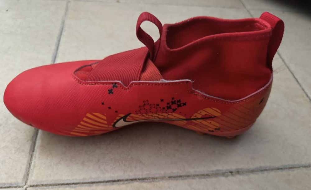 Chuterias bota nike quase novas