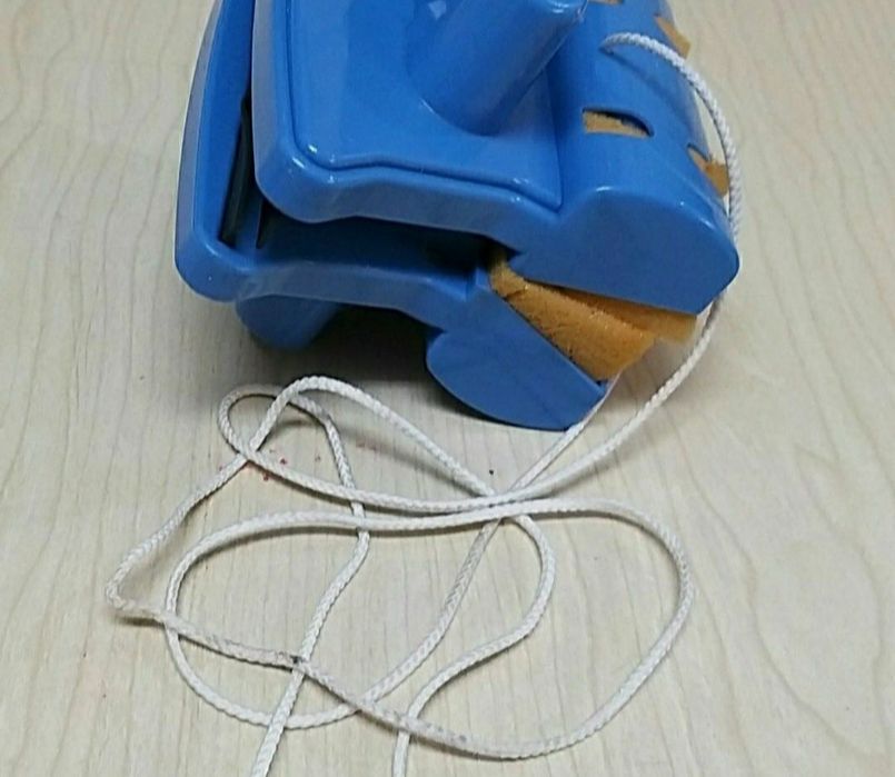 Limpa vidros magnético.