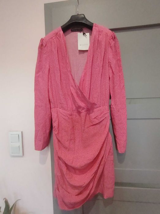 Cukierkowa elegancka sukienka 36