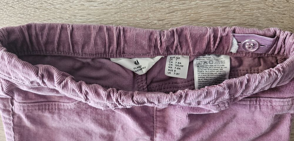 Spodnie sztruksowe dziewczęce dzwony flare h&m 128