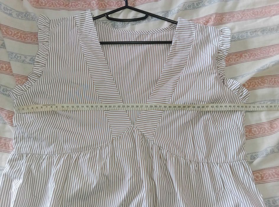 Vestidos e macacão novos