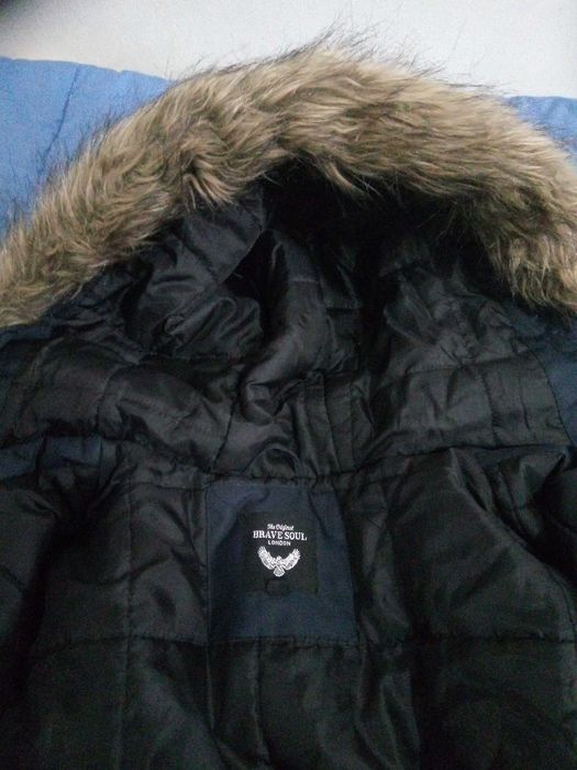 Casaco impermeável.Como novo.