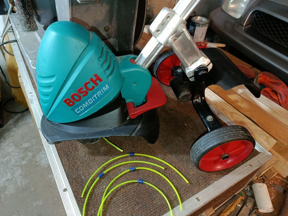 Тример коса bosch art 26 combitrim з колесами і запасними жилками