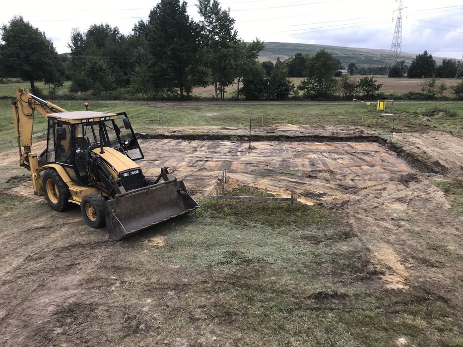 Usługi koparko-ładowarką budowlane koparką kołową transport
