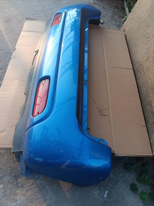 Suzuki ignis I 1 zderzak tył tylny tylni kompletny KPL