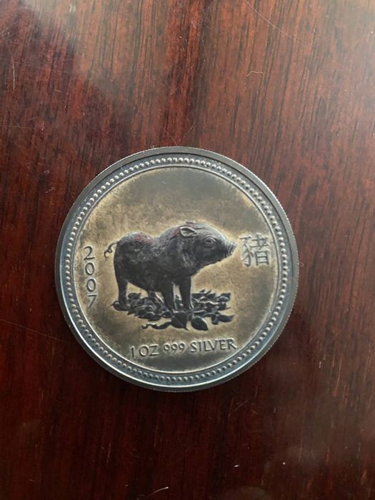 Продам    Серебряная монета Австралии год свиньи