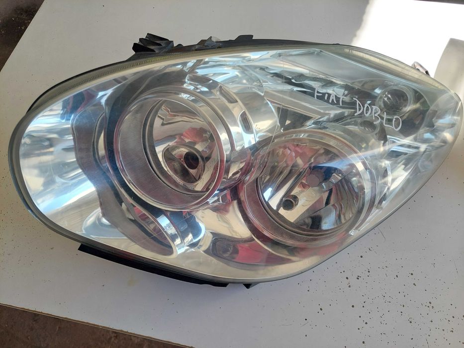farol esq fiat doblo