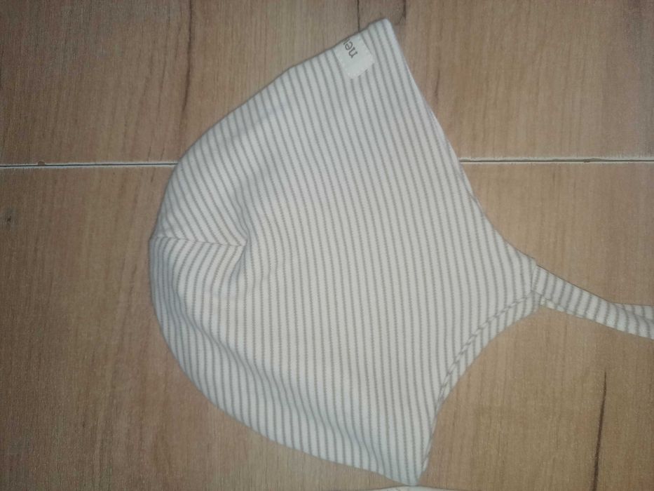 Dwie czapki Newbie 44/46 piękny wzór Chłopiec