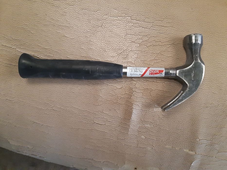 Casaco impermeável + Martelo