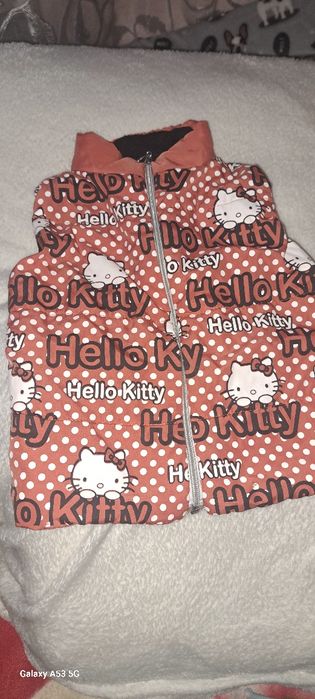 Дитяча жилетка для дівчинки .