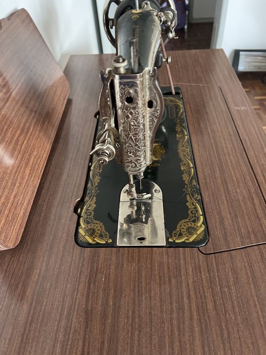 Maquina de costura  singer