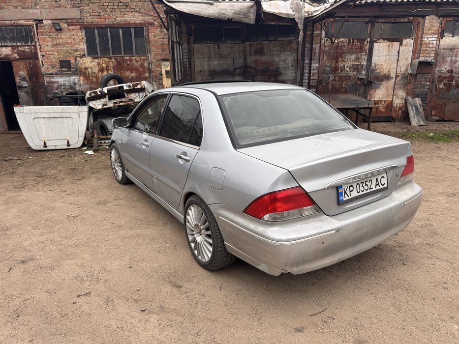 Лансер 9 вираж 1.8