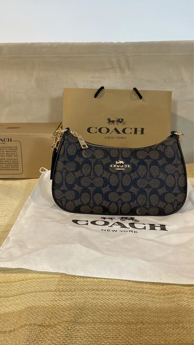 Mala Coach  – Monograma Clássico Castanho