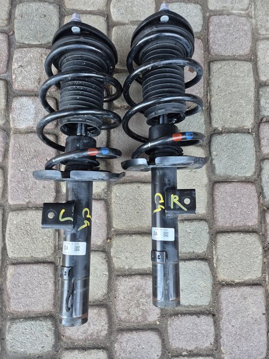 Передні стійки mazda 3bp 2023 awd