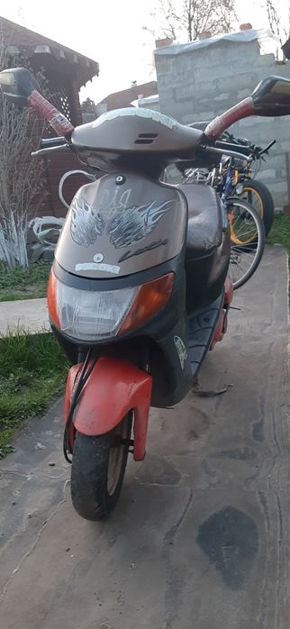 Скутер сузуки летс 1