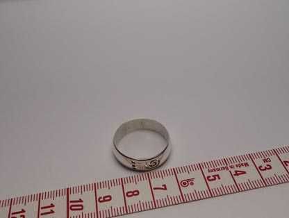 Srebrna obrączka wycinane wzorki R.26. 7 mm.