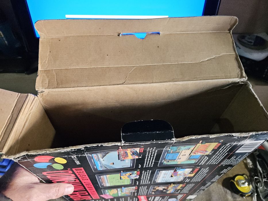 Super Nintendo com caixa