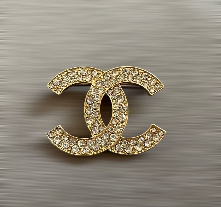 Broszka cc cyrkonia złota